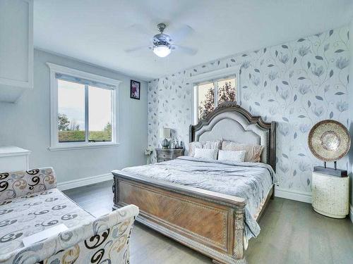 106 Trinity Road, Rural Rocky View County, AB - Indoor Photo Showing Bedroom