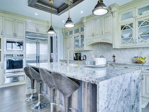 106 Trinity Road, Rural Rocky View County, AB - Indoor Photo Showing Kitchen With Upgraded Kitchen