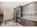 43 Legacy Row Se, Calgary, AB  - Indoor Photo Showing Kitchen 