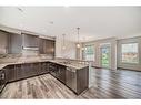 43 Legacy Row Se, Calgary, AB  - Indoor Photo Showing Kitchen With Double Sink With Upgraded Kitchen 