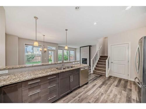 43 Legacy Row Se, Calgary, AB - Indoor Photo Showing Kitchen With Double Sink