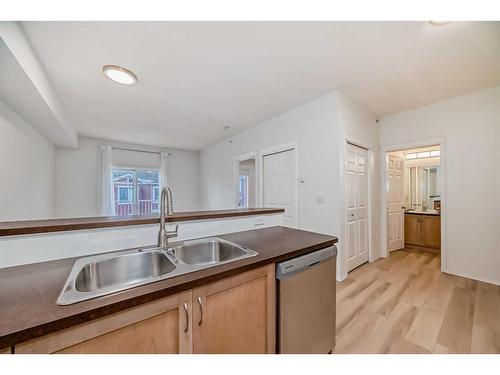 8316-70 Panamount Drive Nw, Calgary, AB - Indoor Photo Showing Kitchen With Double Sink