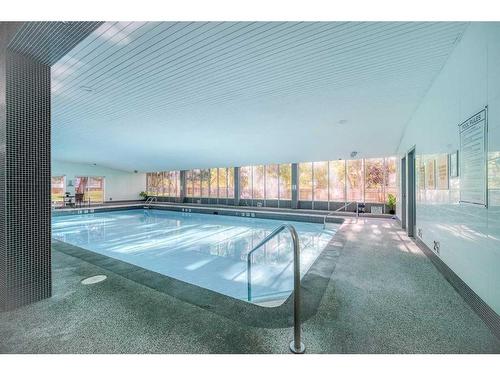 1708-4944 Dalton Drive Nw, Calgary, AB - Indoor Photo Showing Other Room With In Ground Pool