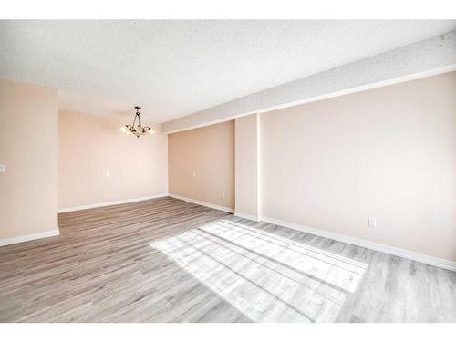 1708-4944 Dalton Drive Nw, Calgary, AB - Indoor Photo Showing Other Room