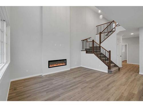 232 Belvedere Drive Se, Calgary, AB - Indoor With Fireplace