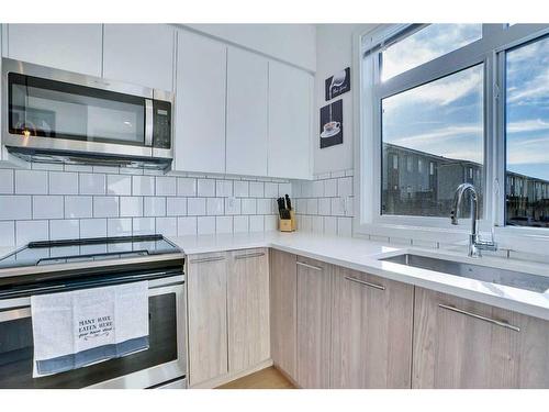 891 Belmont Drive, Calgary, AB - Indoor Photo Showing Kitchen With Upgraded Kitchen