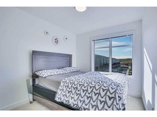 891 Belmont Drive, Calgary, AB - Indoor Photo Showing Bedroom