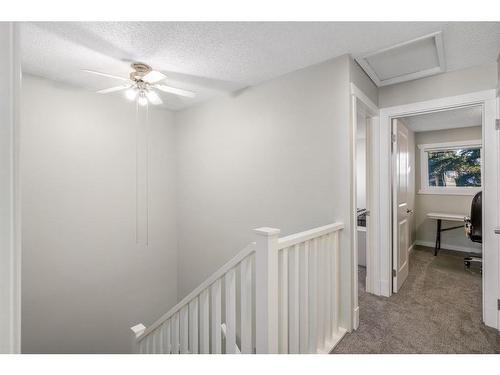 139 Woodsman Lane Sw, Calgary, AB - Indoor Photo Showing Other Room