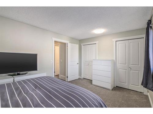 139 Woodsman Lane Sw, Calgary, AB - Indoor Photo Showing Bedroom