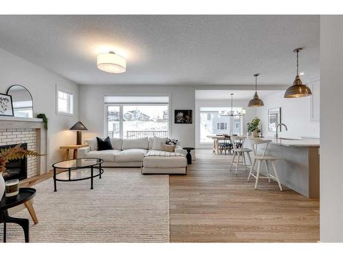 30 Fireside Point, Cochrane, AB - Indoor Photo Showing Living Room With Fireplace