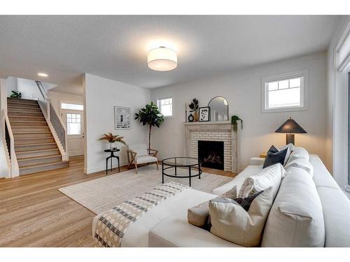 30 Fireside Point, Cochrane, AB - Indoor Photo Showing Living Room With Fireplace