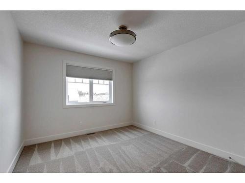 30 Fireside Point, Cochrane, AB - Indoor Photo Showing Other Room