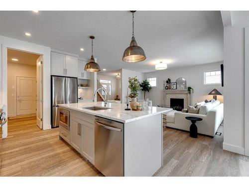 30 Fireside Point, Cochrane, AB - Indoor Photo Showing Kitchen With Stainless Steel Kitchen With Upgraded Kitchen