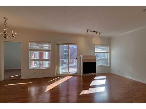 361-333 Riverfront Avenue Se, Calgary, AB - Indoor Photo Showing Other Room With Fireplace