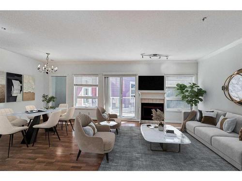 361-333 Riverfront Avenue Se, Calgary, AB - Indoor Photo Showing Living Room With Fireplace