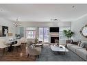 361-333 Riverfront Avenue Se, Calgary, AB  - Indoor Photo Showing Living Room With Fireplace 