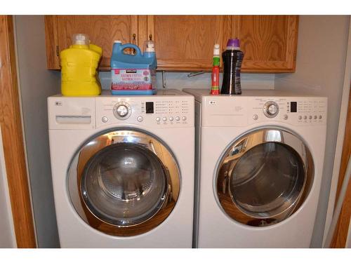 509 Hawkstone Drive Nw, Calgary, AB - Indoor Photo Showing Laundry Room