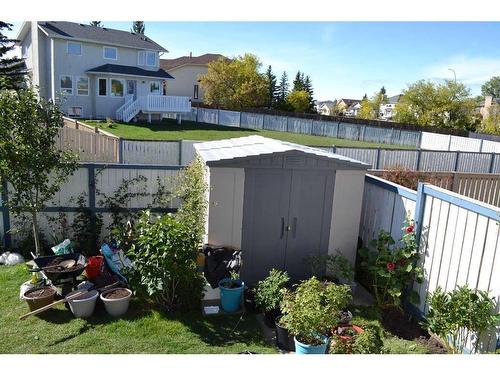 509 Hawkstone Drive Nw, Calgary, AB - Outdoor With Backyard