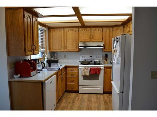 509 Hawkstone Drive Nw, Calgary, AB - Indoor Photo Showing Kitchen With Double Sink