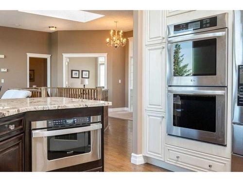 43 Palomino Boulevard, Rural Rocky View County, AB - Indoor Photo Showing Kitchen