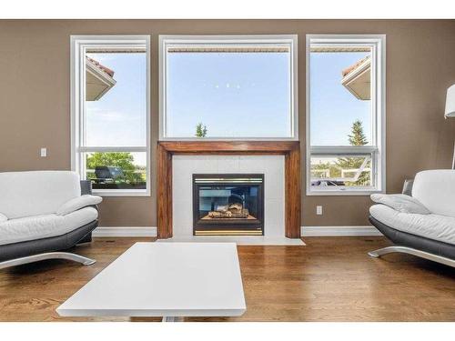 43 Palomino Boulevard, Rural Rocky View County, AB - Indoor Photo Showing Living Room With Fireplace