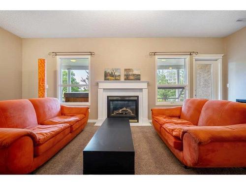 43 Palomino Boulevard, Rural Rocky View County, AB - Indoor Photo Showing Living Room With Fireplace