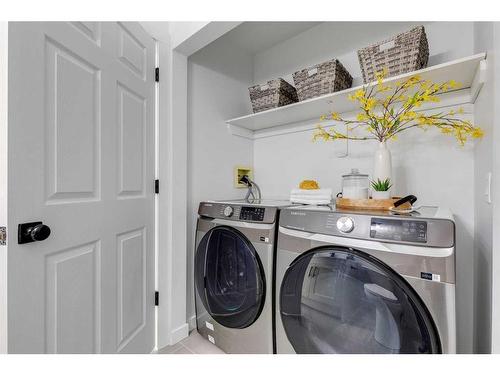 16 Hawktree Close Nw, Calgary, AB - Indoor Photo Showing Laundry Room