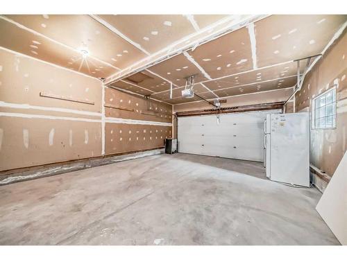 16 Hawktree Close Nw, Calgary, AB - Indoor Photo Showing Garage