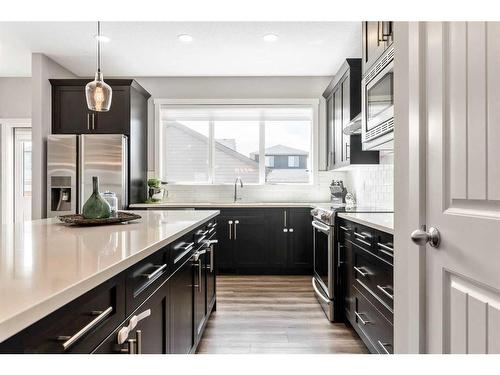 32 Legacy Glen Manor Se, Calgary, AB - Indoor Photo Showing Kitchen With Upgraded Kitchen