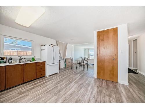 5 Spruce Drive, Drumheller, AB - Indoor Photo Showing Kitchen With Double Sink