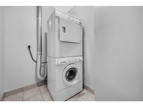 C-1407 44 Street Ne, Calgary, AB - Indoor Photo Showing Laundry Room