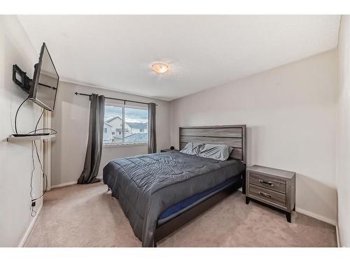 122 Silverado Range View Sw, Calgary, AB - Indoor Photo Showing Bedroom