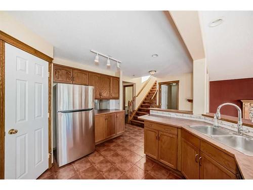 180 West Creek Drive, Chestermere, AB - Indoor Photo Showing Kitchen With Double Sink