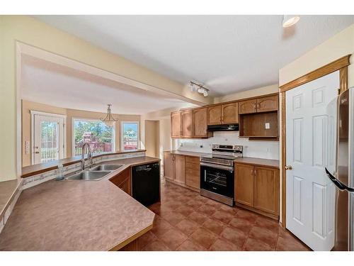 180 West Creek Drive, Chestermere, AB - Indoor Photo Showing Kitchen With Double Sink