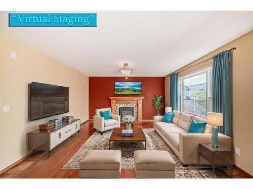 180 West Creek Drive, Chestermere, AB - Indoor Photo Showing Living Room With Fireplace