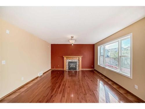 180 West Creek Drive, Chestermere, AB - Indoor Photo Showing Living Room With Fireplace