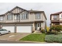 51 Everridge Villas Sw, Calgary, AB  - Outdoor With Facade 