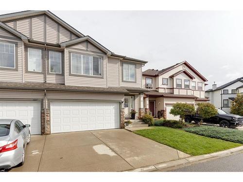 51 Everridge Villas Sw, Calgary, AB - Outdoor With Facade