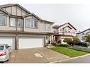 51 Everridge Villas Sw, Calgary, AB  - Outdoor With Facade 