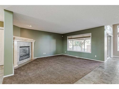 50 Somerside Crescent Sw, Calgary, AB - Indoor With Fireplace