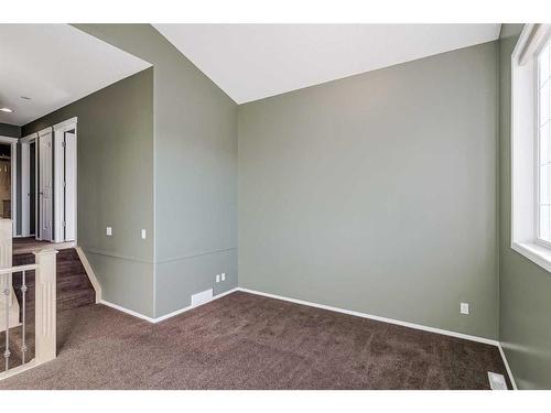 50 Somerside Crescent Sw, Calgary, AB - Indoor Photo Showing Other Room