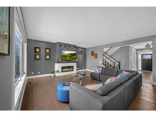 57 Rockcliff Heights Nw, Calgary, AB - Indoor Photo Showing Living Room With Fireplace