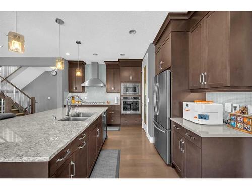 57 Rockcliff Heights Nw, Calgary, AB - Indoor Photo Showing Kitchen With Double Sink With Upgraded Kitchen