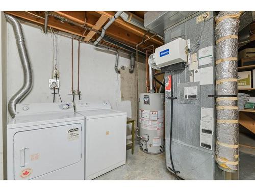 56-10910 Bonaventure Drive Se, Calgary, AB - Indoor Photo Showing Laundry Room