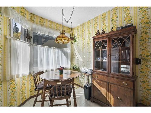 56-10910 Bonaventure Drive Se, Calgary, AB - Indoor Photo Showing Dining Room