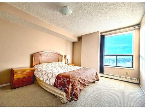 806-9800 Horton Road Sw, Calgary, AB - Indoor Photo Showing Bedroom