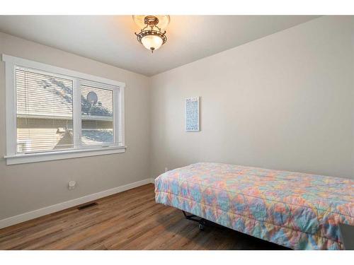 25 2 Street Se, High River, AB - Indoor Photo Showing Bedroom