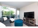 115-235 9A Street Nw, Calgary, AB  - Indoor Photo Showing Living Room 