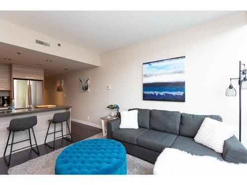 115-235 9A Street Nw, Calgary, AB - Indoor Photo Showing Living Room