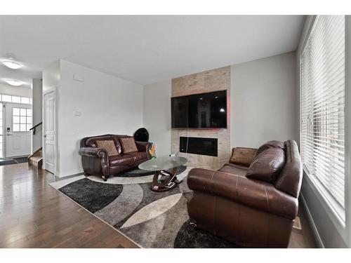 113 Redstone Park Ne, Calgary, AB - Indoor Photo Showing Living Room With Fireplace